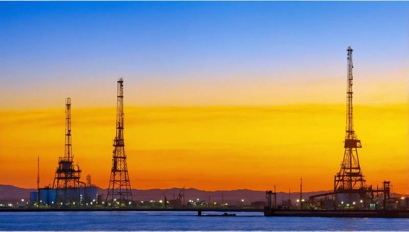 Oil prices fall on US-Iran progress, global shares rise in turbulent trade