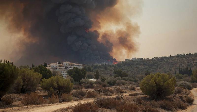 Two dead, homes burn in massive wildfire in Cyprus
