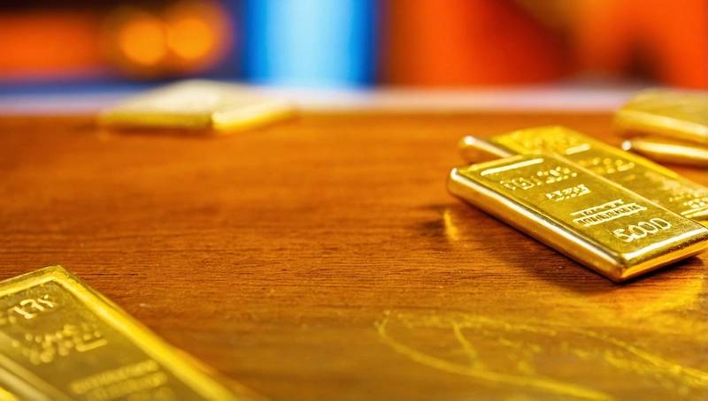 Gold rises on weaker dollar following Fed rate cut