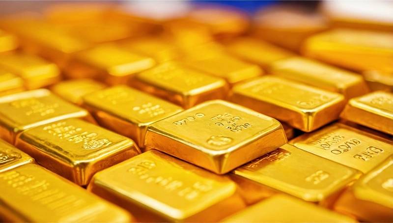 Gold prices fall over 2% as dollar firms and investors book profits