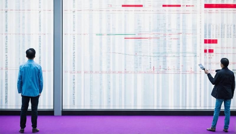 Asian shares finish November with a strong performance, helped by Fed cuts