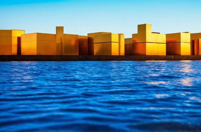 Gold prices rise on the back of a weaker dollar but Fed rate cuts dimming hopes limit growth